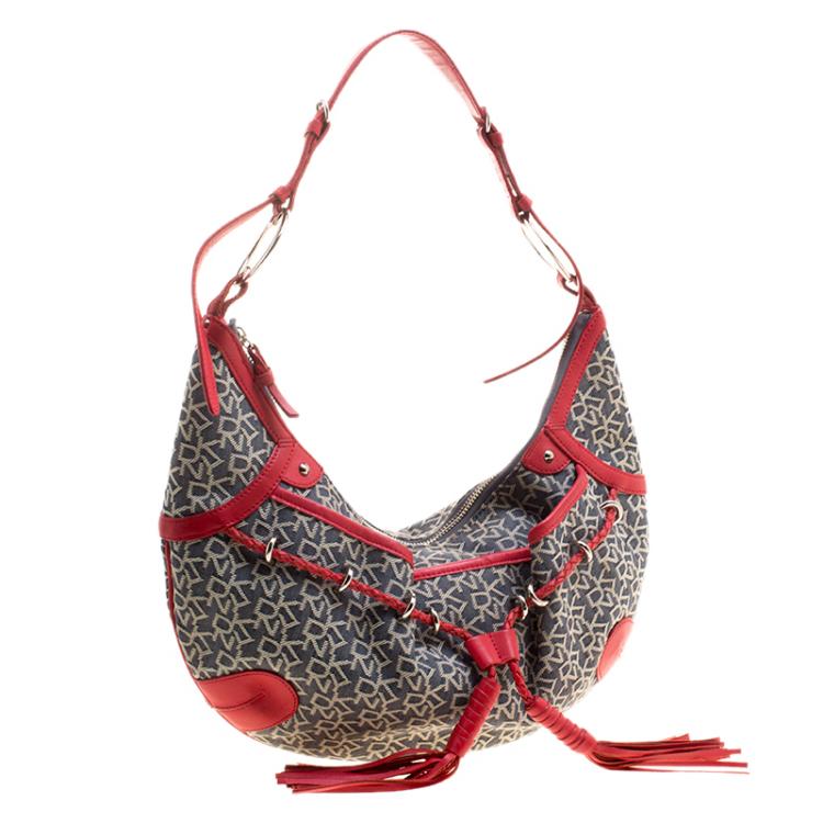 Pre Owned Dkny Red/Grey Monogram Canvas Tassel Hobo