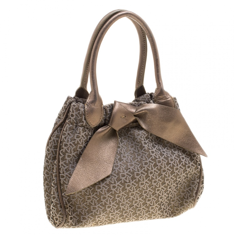 مملوكة مسبقًا DKNY Metallic Gun Metal Monogram Canvas Bow Tote