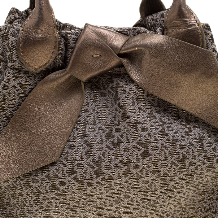مملوكة مسبقًا DKNY Metallic Gun Metal Monogram Canvas Bow Tote