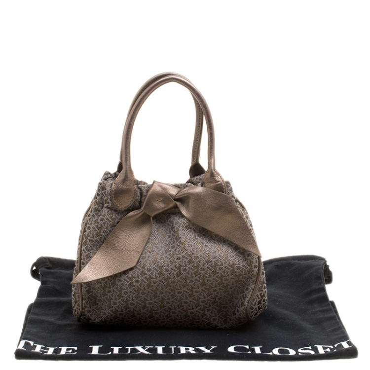 مملوكة مسبقًا DKNY Metallic Gun Metal Monogram Canvas Bow Tote