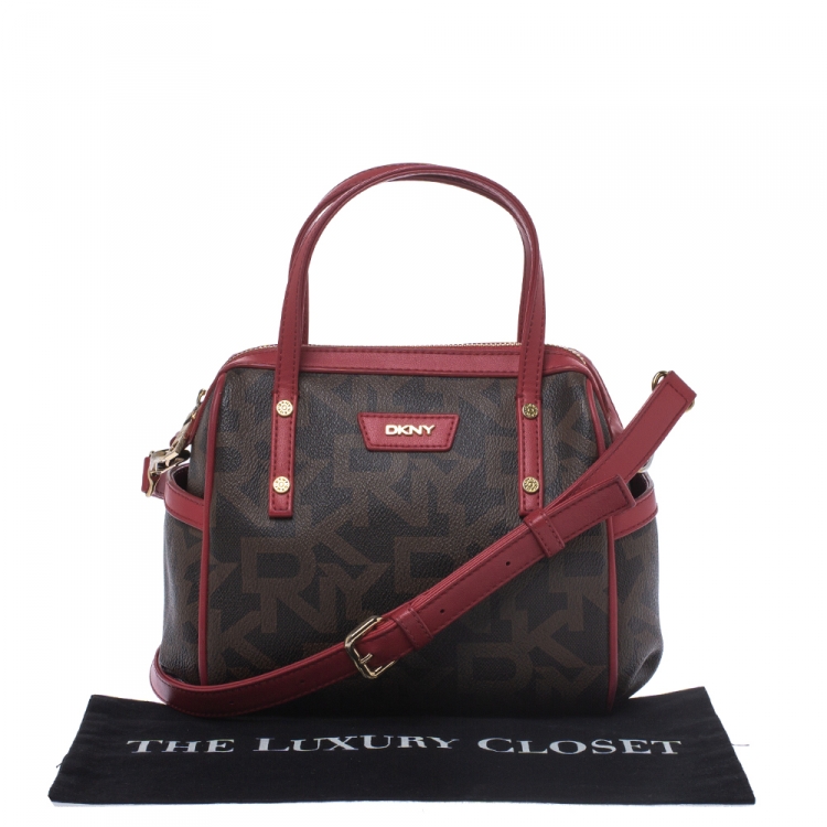 Pre Owned Dkny Brown/Red Monogram Coated Canvas and Leather Boston Bag