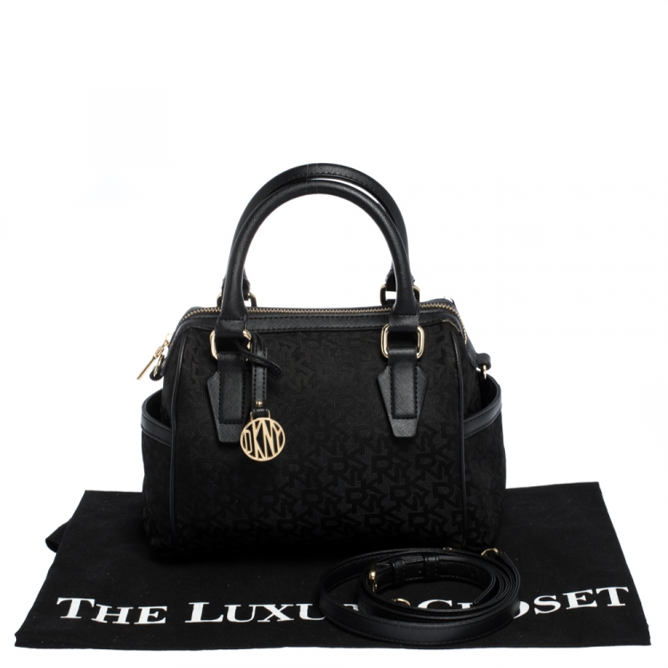Pre Owned Dkny Black Canvas and Leather Side Pocket Satchel