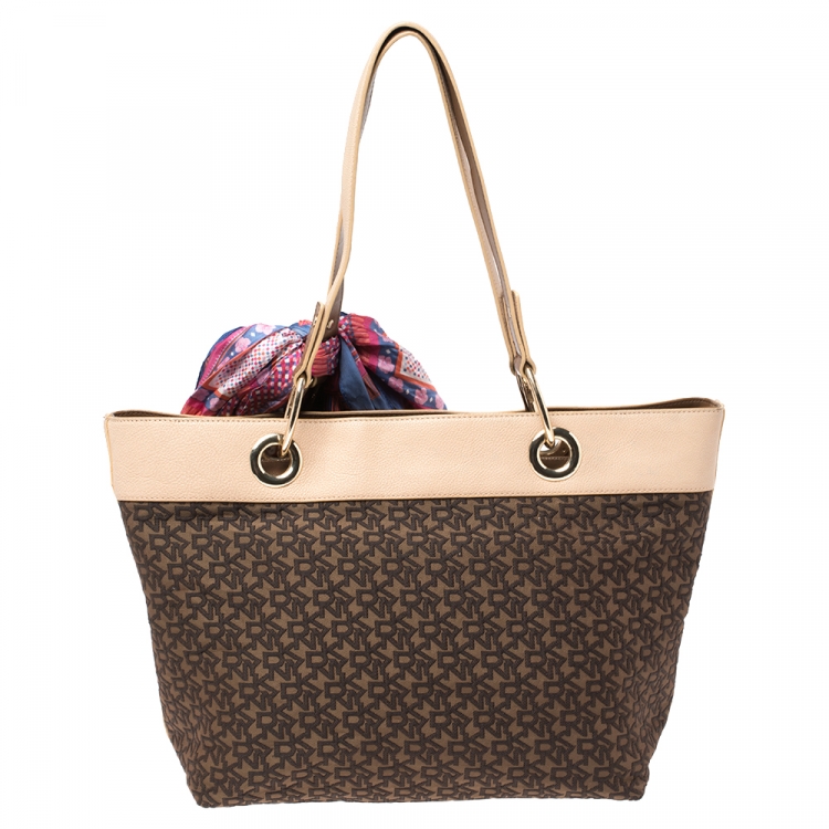Pre Owned Dkny Beige Signature Canvas and Leather Tote 