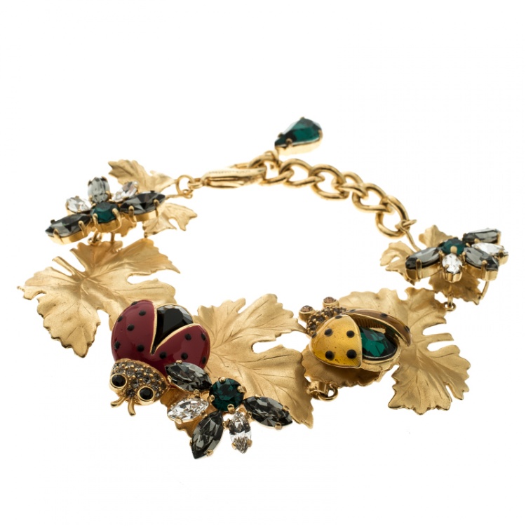 Pre Owned Dolce and Gabbana Ladybug Leaf Enamel Crystal Embellished Gold Tone Bracelet 