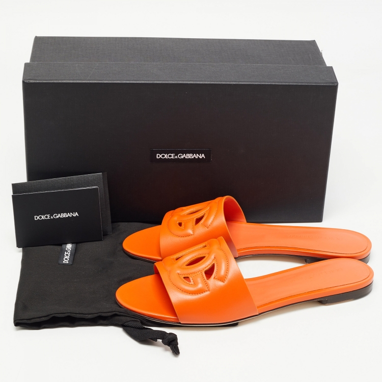 Pre Owned Dolce & Gabbana Orange Leather DG Cut Out Logo Flat Slides Size 37
