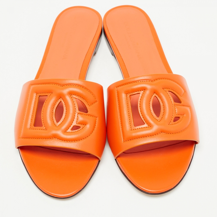 Pre Owned Dolce & Gabbana Orange Leather DG Cut Out Logo Flat Slides Size 37