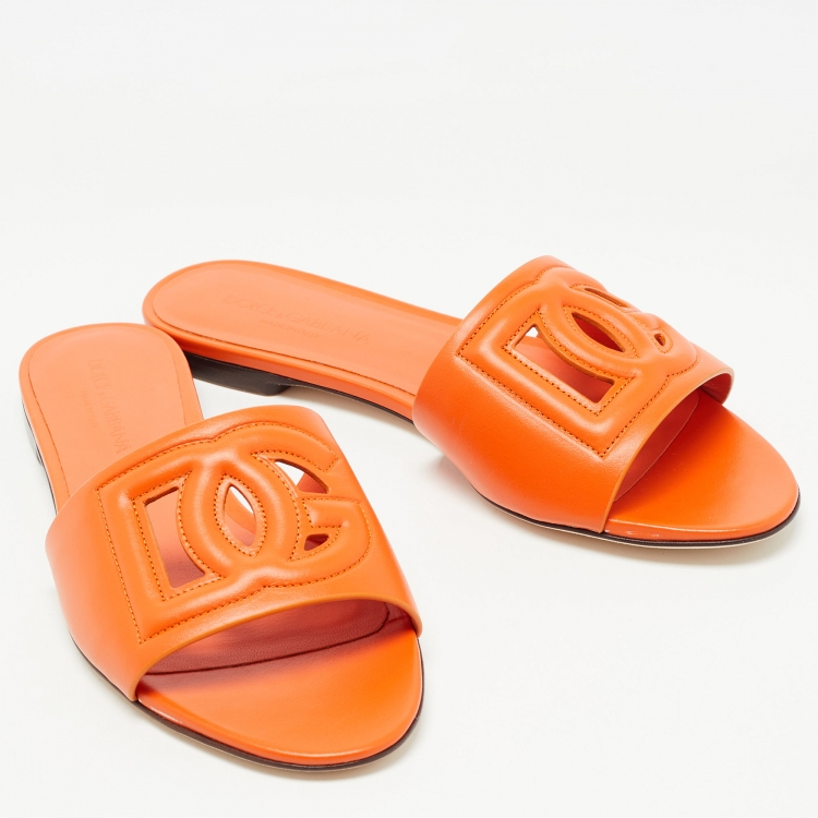 Pre Owned Dolce & Gabbana Orange Leather DG Cut Out Logo Flat Slides Size 37