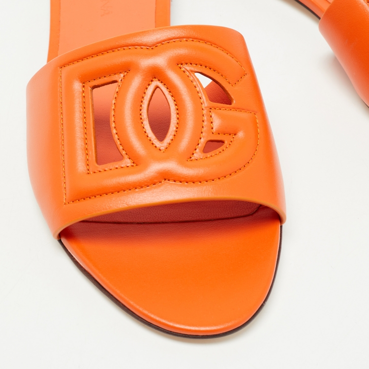 Pre Owned Dolce & Gabbana Orange Leather DG Cut Out Logo Flat Slides Size 37