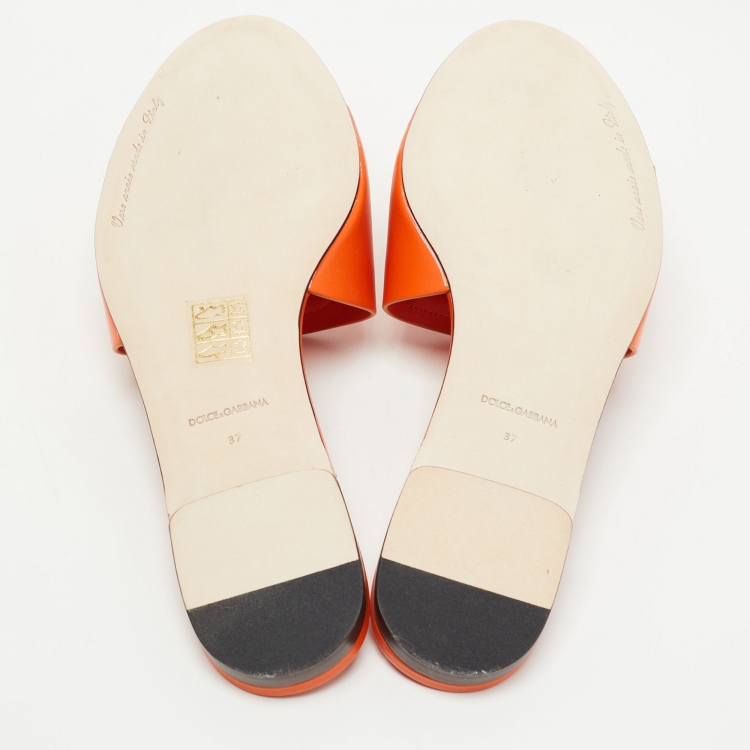 Pre Owned Dolce & Gabbana Orange Leather DG Cut Out Logo Flat Slides Size 37