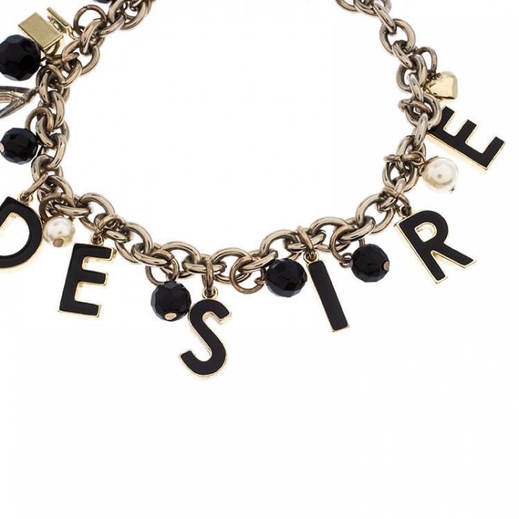 Pre Owned Dolce and Gabbana Desire Charm Enamel Gold Tone Bracelet