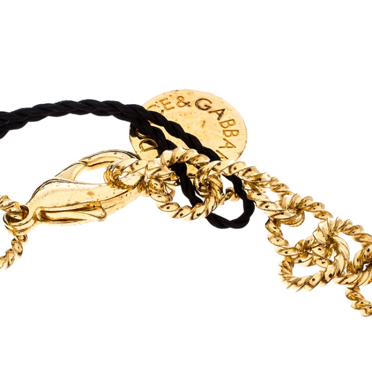 Pre Owned Dolce and Gabbana Amore Red Woven Gold Tone Charm Bracelet
