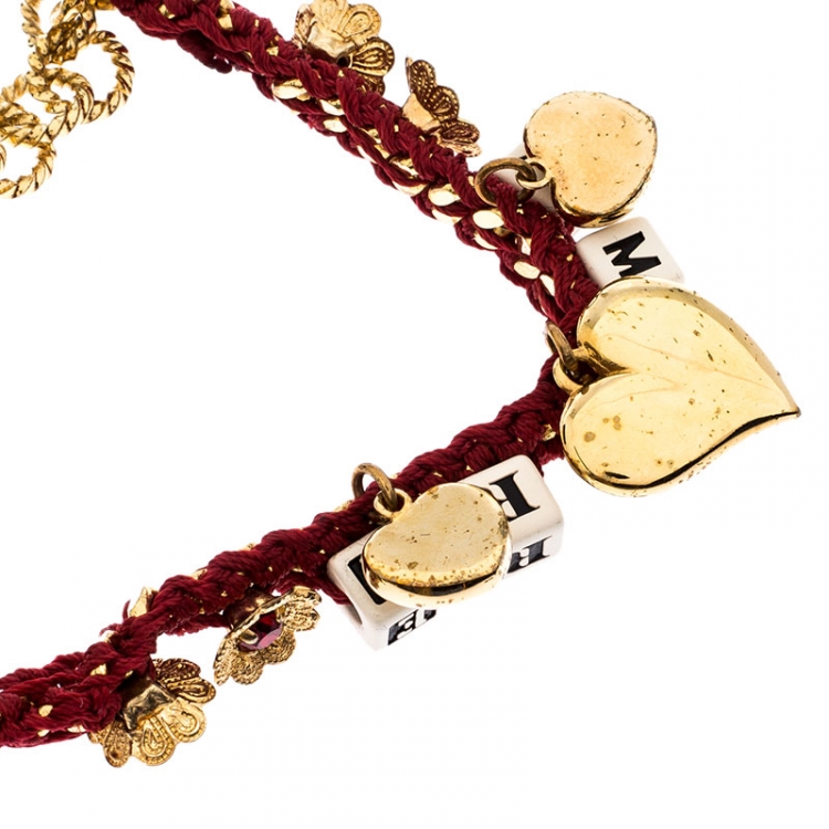 Pre Owned Dolce and Gabbana Amore Red Woven Gold Tone Charm Bracelet