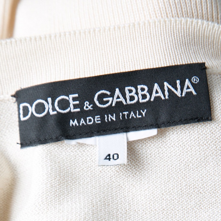 Pre Owned Dolce and Gabbana Beige Shoulder Button Detail Ribbed Hem Short Sleeve Sweater S