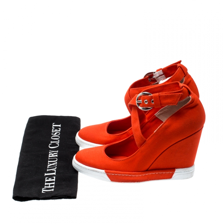 Pre Owned Dolce And Gabbana Orange Canvas Wedge Heel Cross Strap Platform Pumps Size 40