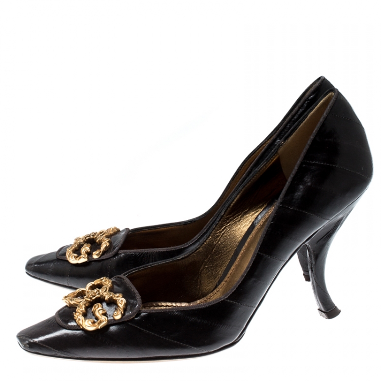 مملوكة مسبقًا Dolce & Gabbana Black Eel Skin Metal Logo Pumps Size 39