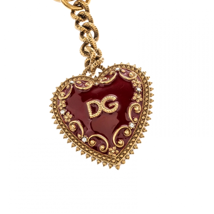 Pre Owned Dolce and Gabbana Red Heart Charm Textured Gold Tone Key Chain