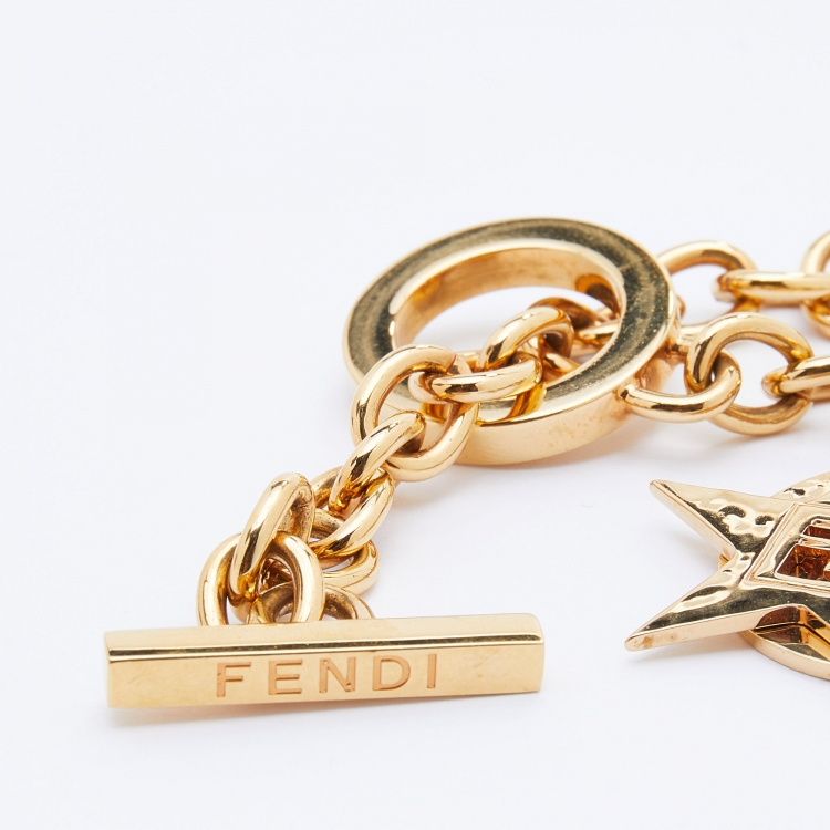 Pre Owned Fendi Gold Tone Heart Star Charm Chain Link Toggle Bracelet