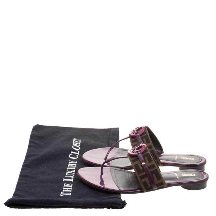 مملوكة مسبقًا Fendi Purple Leather and Zucca Canvas Flat Thong Sandals Size 41.5