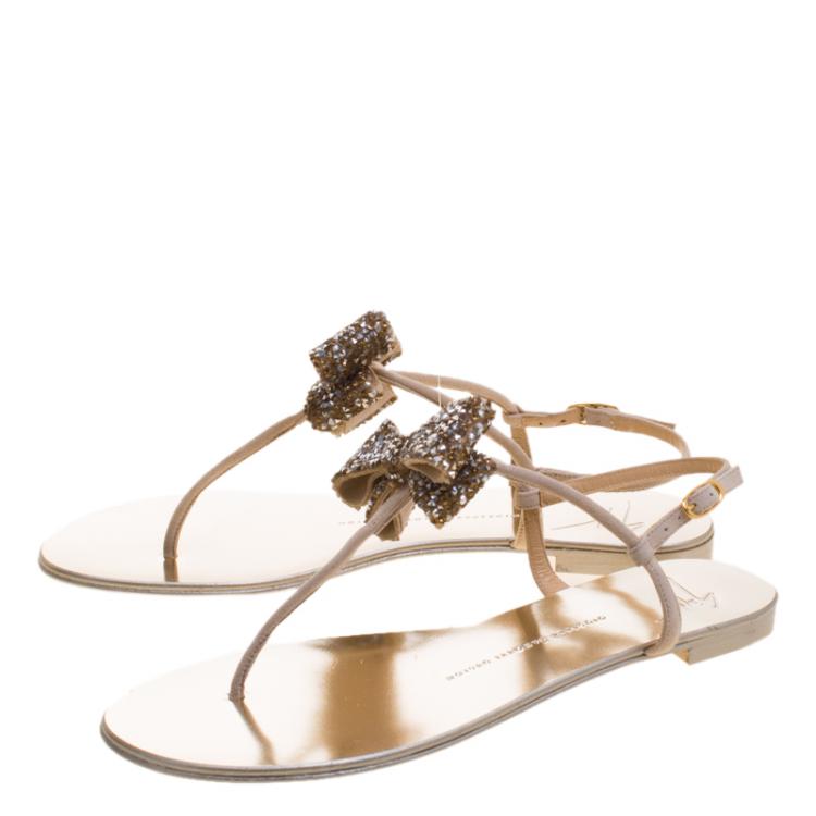 Pre Owned Giuseppe Zanotti Beige Suede Rock Crystal Embellished Bow Flat Thong Sandals Size 40.5