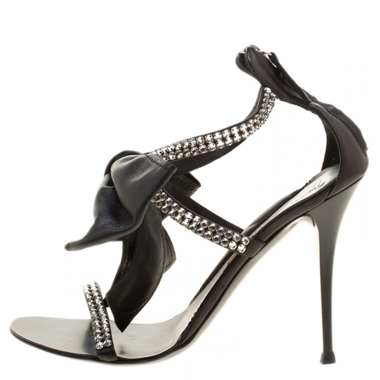 Pre Owned Giuseppe Zanotti Black Crystal Embellished Strappy Leather Bow Detail Ankle Strap Sandals Size 38.5