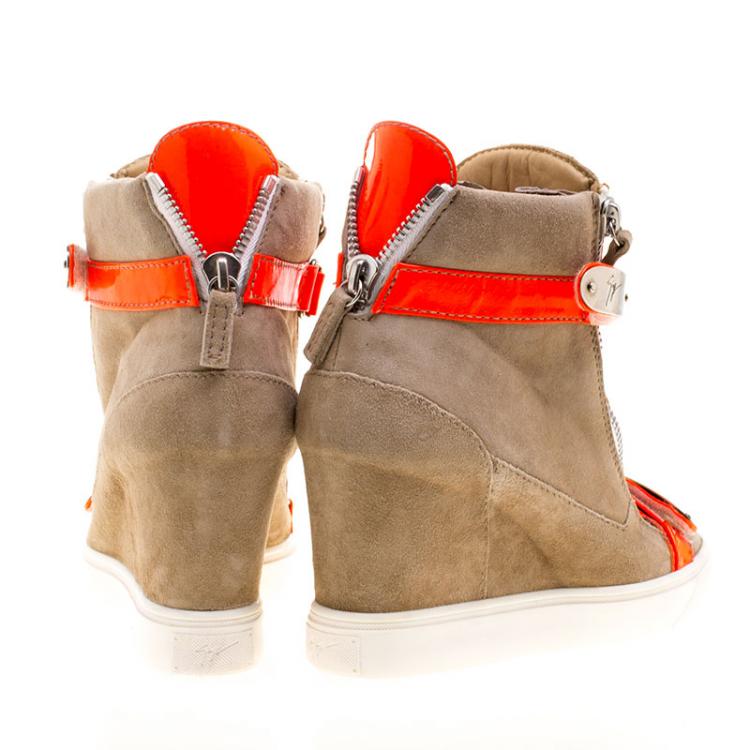 مملوكة مسبقًا Giuseppe Zanotti Beige Suede and Fluorescent Orange Patent Leather Wedge Sneakers Size 40