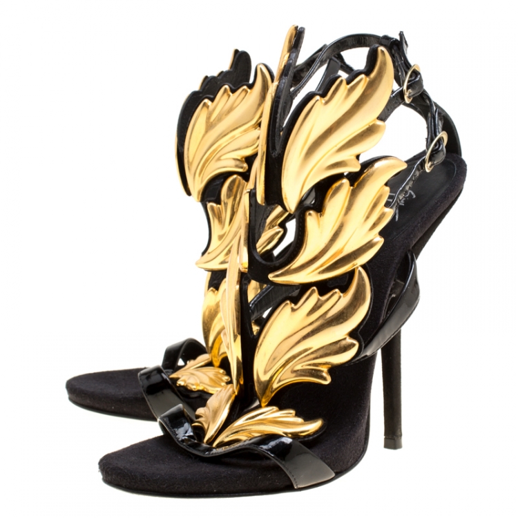 Pre Owned Giuseppe Zanotti Black Patent Leather Argent Metal Wing Embellished Strappy Sandals Size 38.5