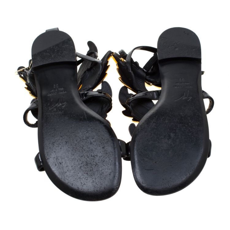 Pre Owned Giuseppe Zanotti Black And Gold Leather Cruel Summer Wing Flat Sandals Size 39