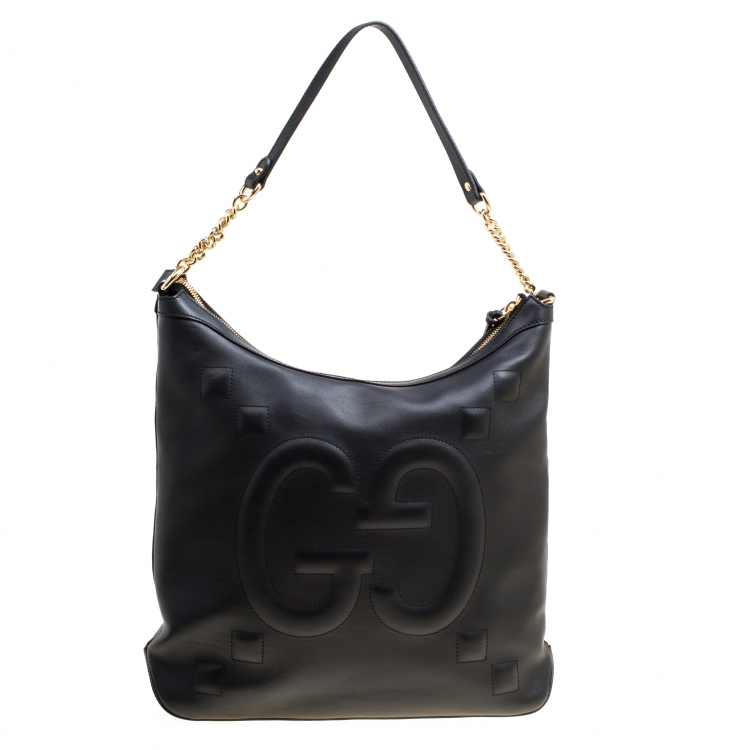 black embossed gucci bag