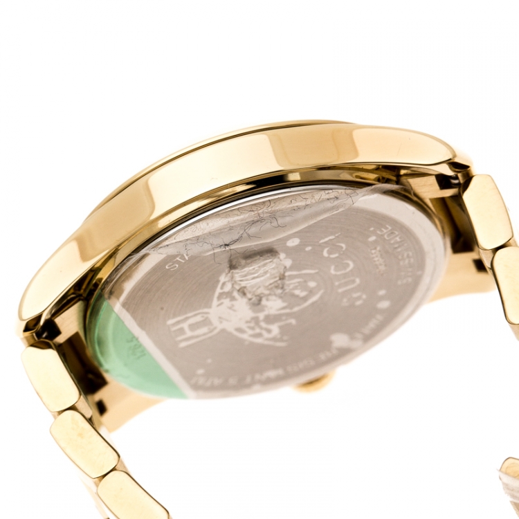 Pre Owned Gucci Cream Gold Plated Stainless Steel G-Timeless 126.5 Women's Wristwatch 27 mm