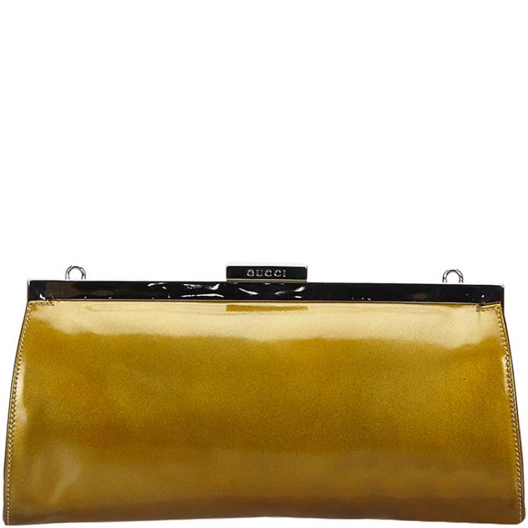 gold gucci clutch bag