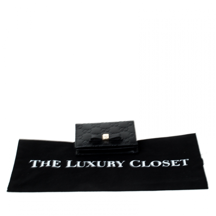Pre Owned Gucci Black Guccissima Leather Bow Bifold Wallet