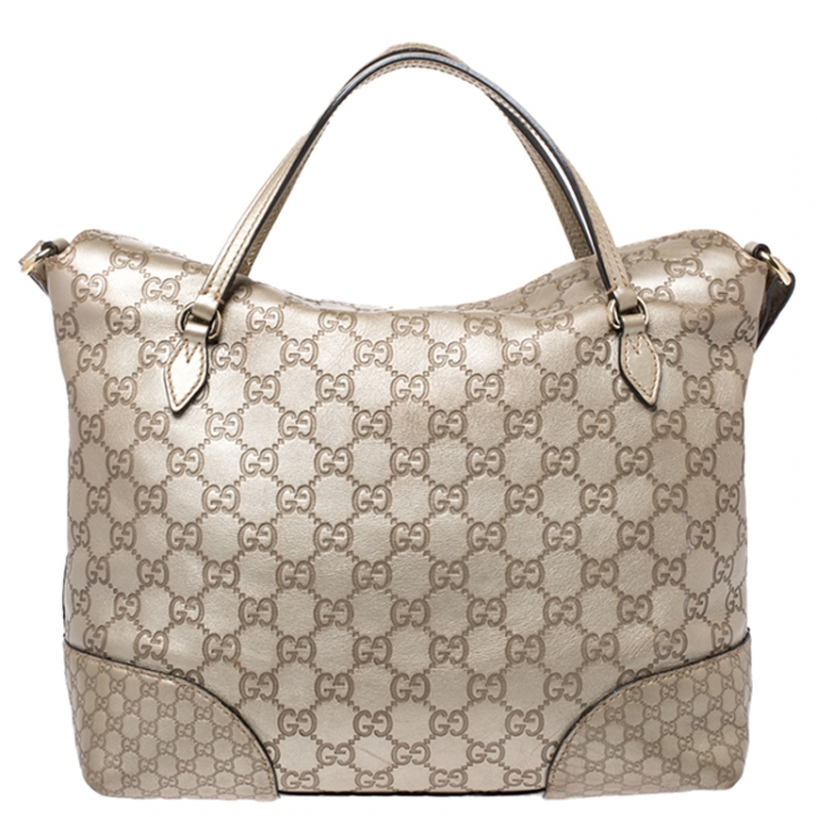 Pre Owned Gucci Gold Guccissima Leather Medium Bree Top Handle Bag