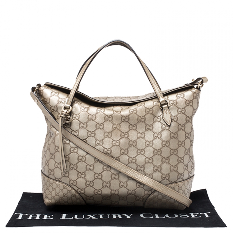 Pre Owned Gucci Gold Guccissima Leather Medium Bree Top Handle Bag