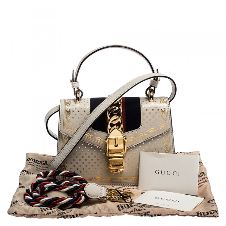 Pre Owned Gucci Cream Star Print Leather Mini Sylvie Top Handle Bag