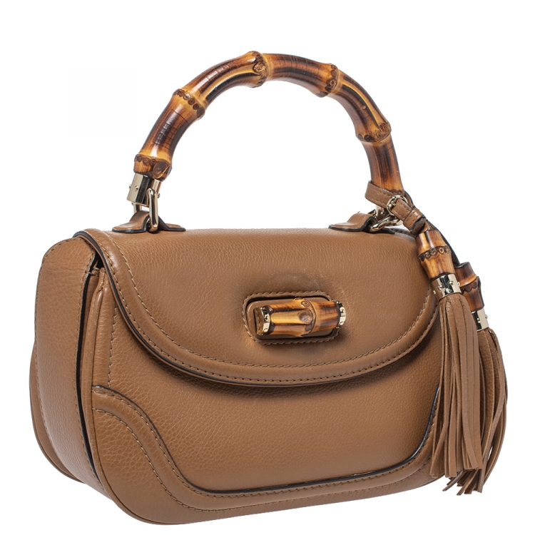 مملوكة مسبقًا Gucci Tan Leather Medium Tassel Bamboo Top Handle Bag