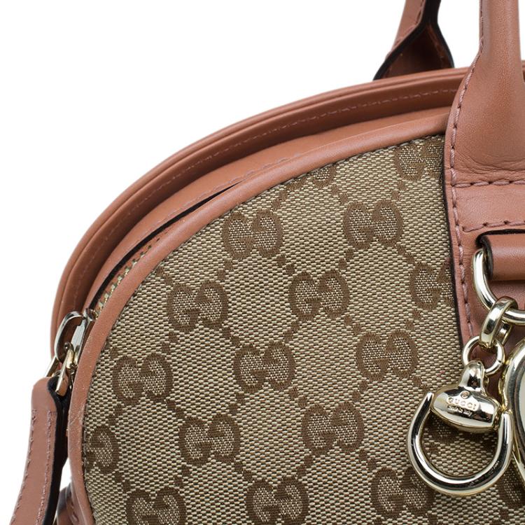 Pre Owned Gucci Beige Monogram Canvas Small Heart Bit Top Handle Bag