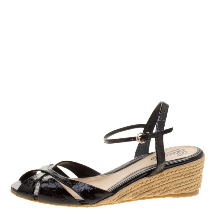 Patent Leather Wedge Sandals in Black - Gucci