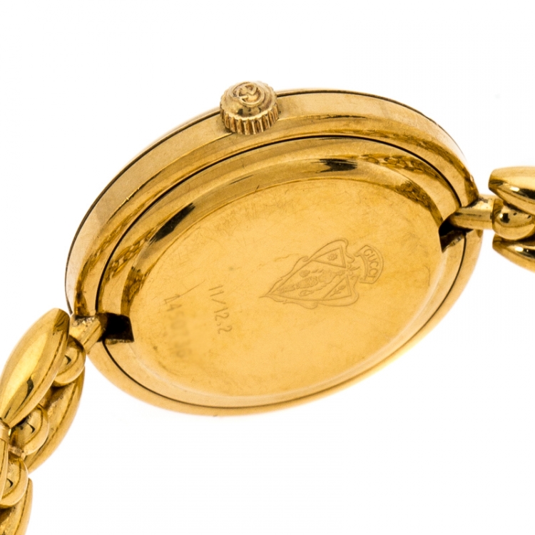 Pre Owned Gucci White Yellow Gold Plated Vintage Interchangeable Bezel 11/12.2 Women's Wristwatch 26 mm