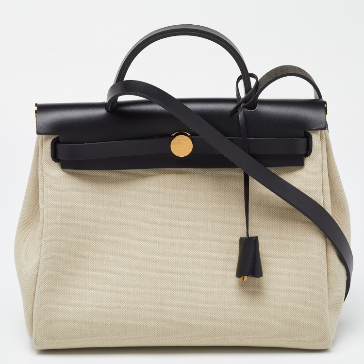 مملوكة مسبقًا Hermès Beige/Black Canvas and Vache Hunter Leather Herbag Zip 31 Bag