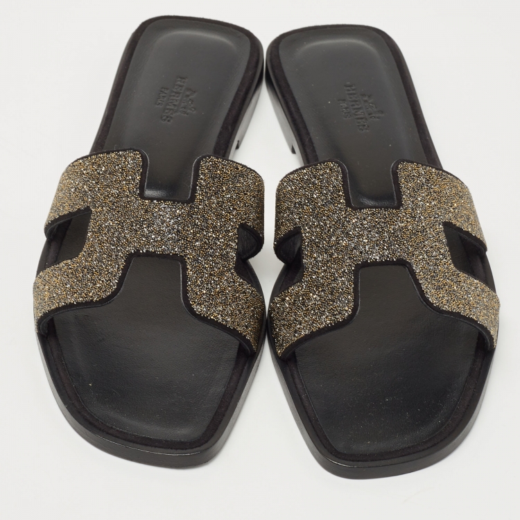 Pre Owned Hermes Gold/Black Suede And Glitter Oran Slide Flats Size 38 