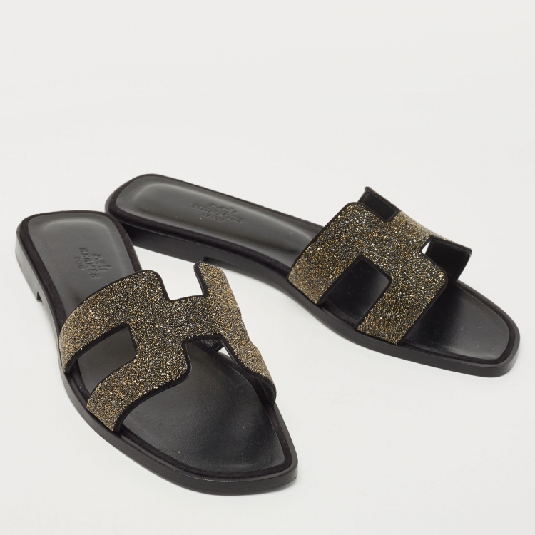 Pre Owned Hermes Gold/Black Suede And Glitter Oran Slide Flats Size 38 