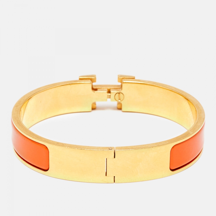 Pre Owned Hermes Clic H Orange Enamel Gold Plated Narrow Bracelet