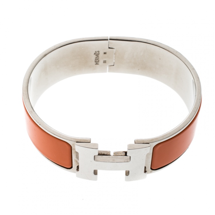 Pre Owned Hermes Clic Clac H Orange Enamel Palladium Plated Wide Bracelet GM