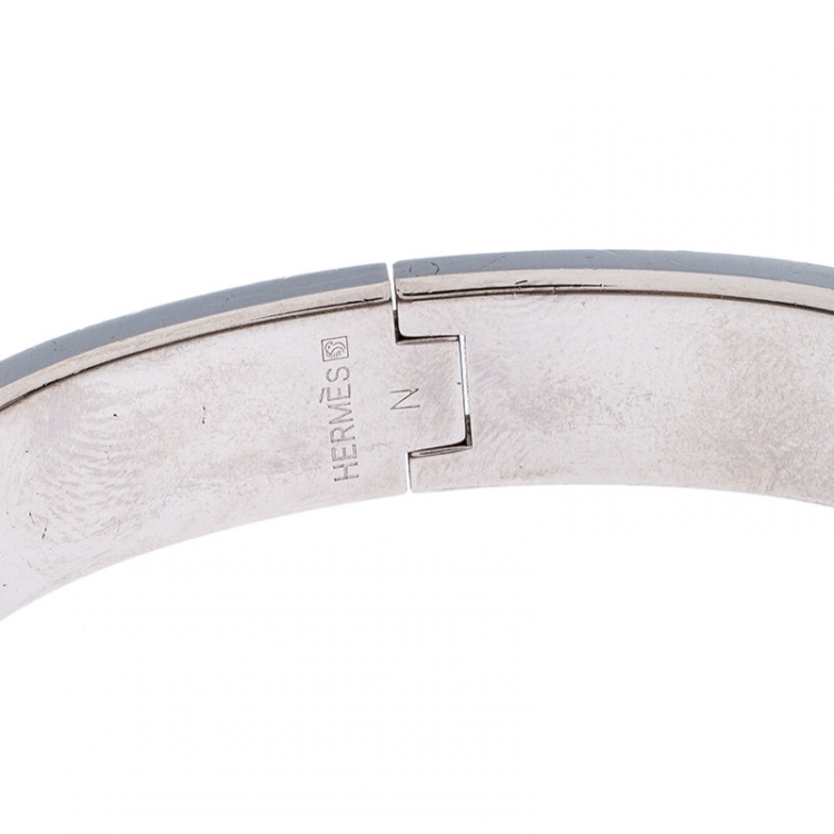 Pre Owned Hermes Clic H Orange Enamel Palladium Plated Bracelet PM