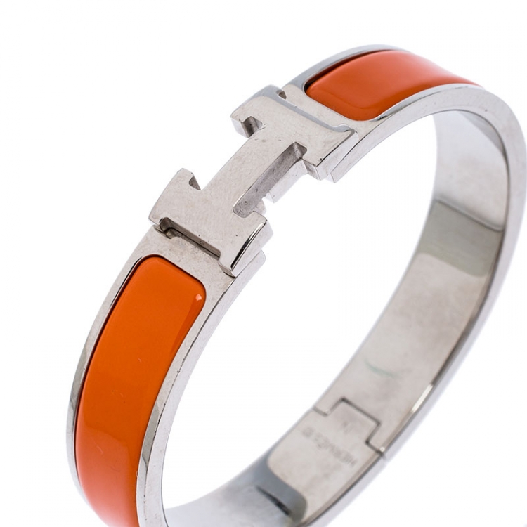 Pre Owned Hermes Clic H Orange Enamel Palladium Plated Bracelet PM