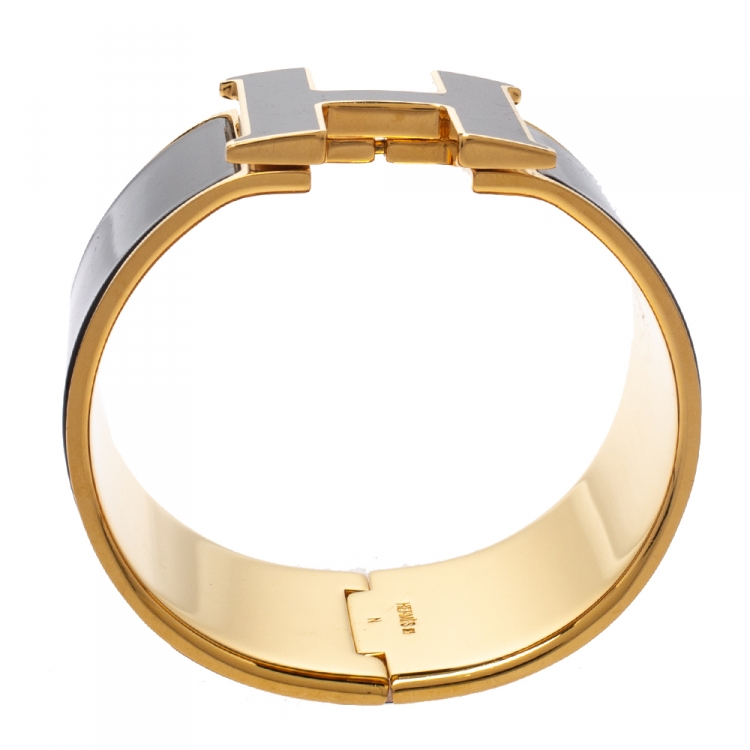 Pre Owned Hermès Clic Clac H Black Enamel Gold Plated Wide Bracelet PM