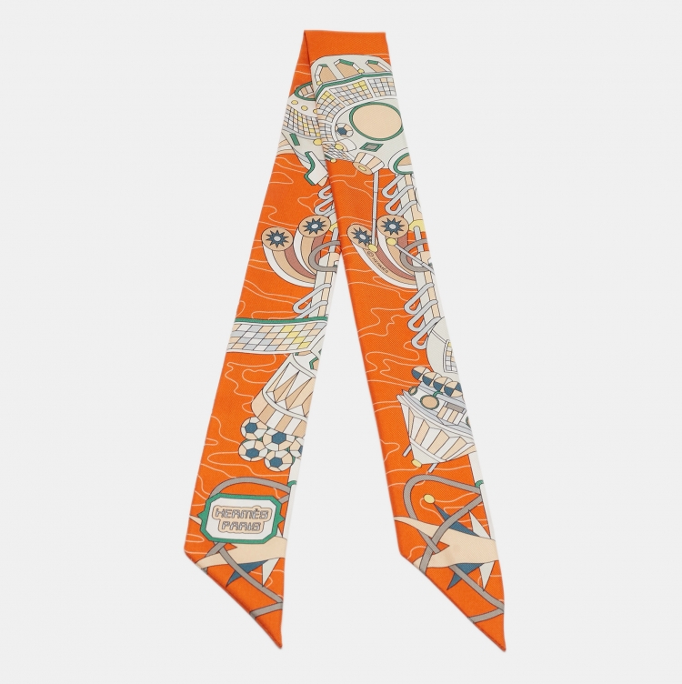 Pre Owned Hermes Orange Print Silk Odyssey Twilly 