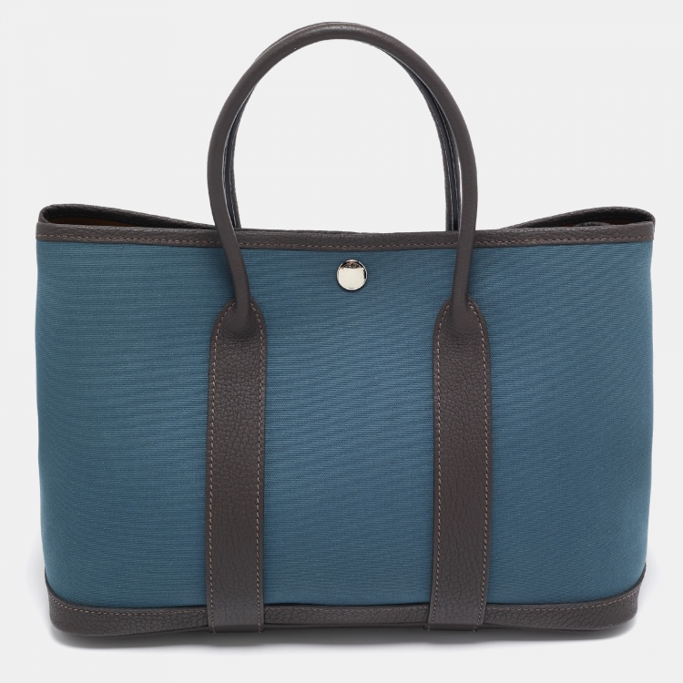 Pre Owned Hermes Bleu Tempete/Ebene Toile Officier and Negonda Leather Garden Party 30 Bag