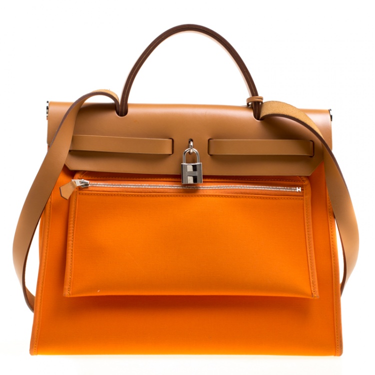 Pre Owned Hermes Brown/Capucines Leather and Fabric Herbag Zip 31 Bag