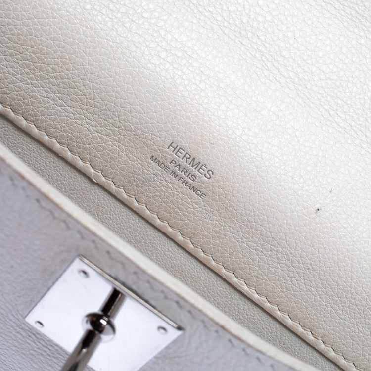 Pre Owned Hermes White Swift Leather Palladium Hardware Kelly Cut Clutch